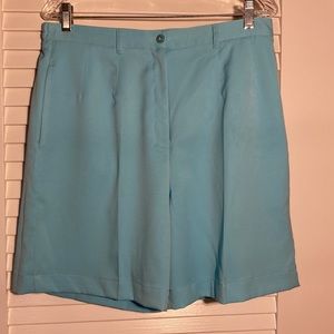 Coral Bay Golf aqua shorts with pockets, size 12. 97% polyester 3% spandex.